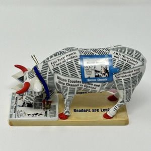 Decorative Newspaper-Print Ceramic Cow Parade